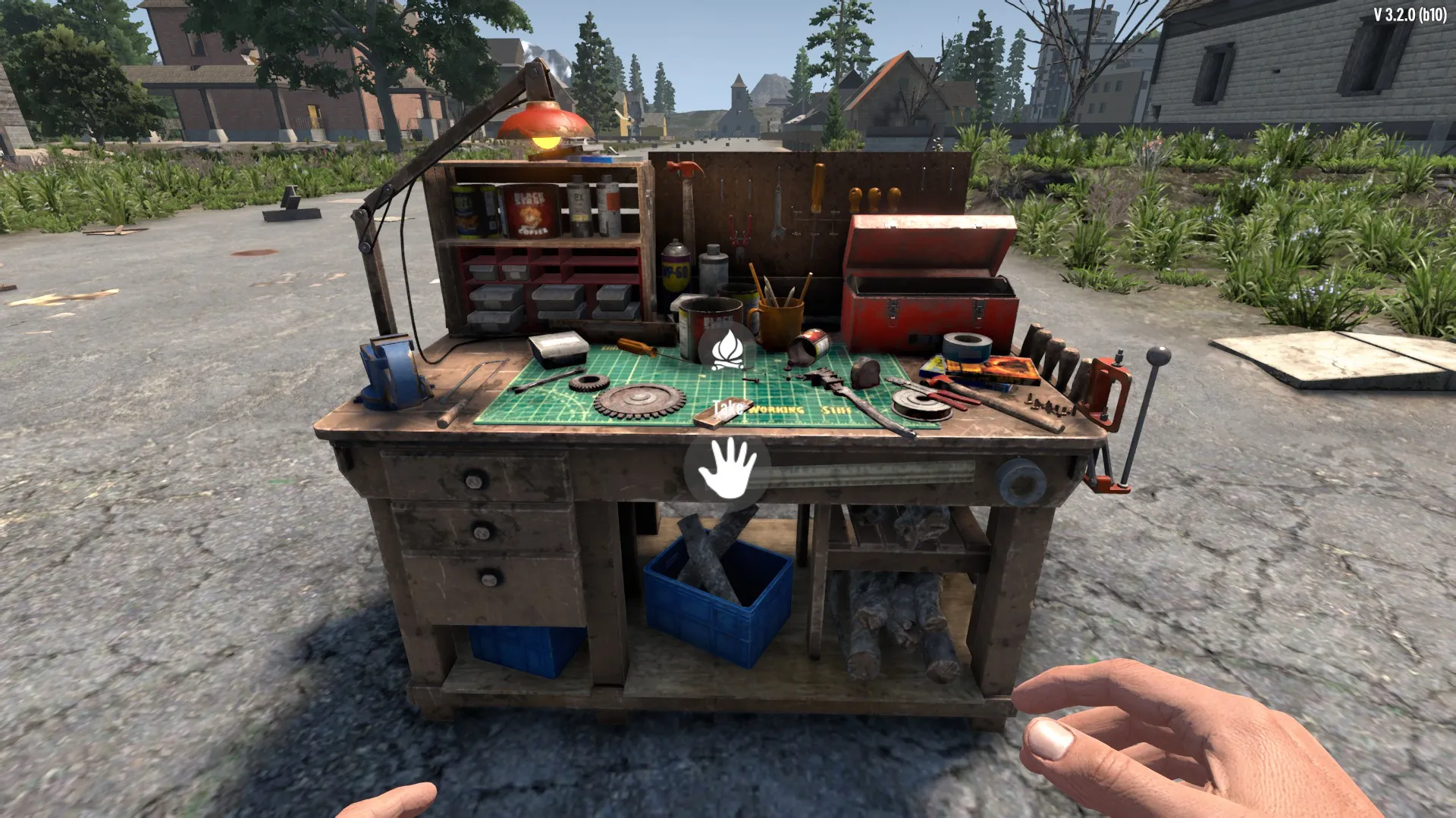 The Take action appears over a tool-covered workbench in PickupBlocks for 7 Days to Die.
