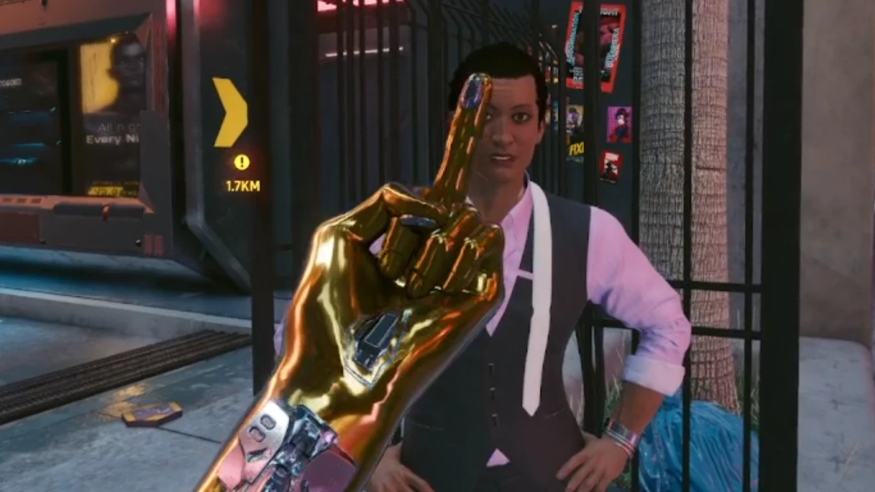 V raises a gold cybernetic middle finger toward an NPC during a Provoke interaction.