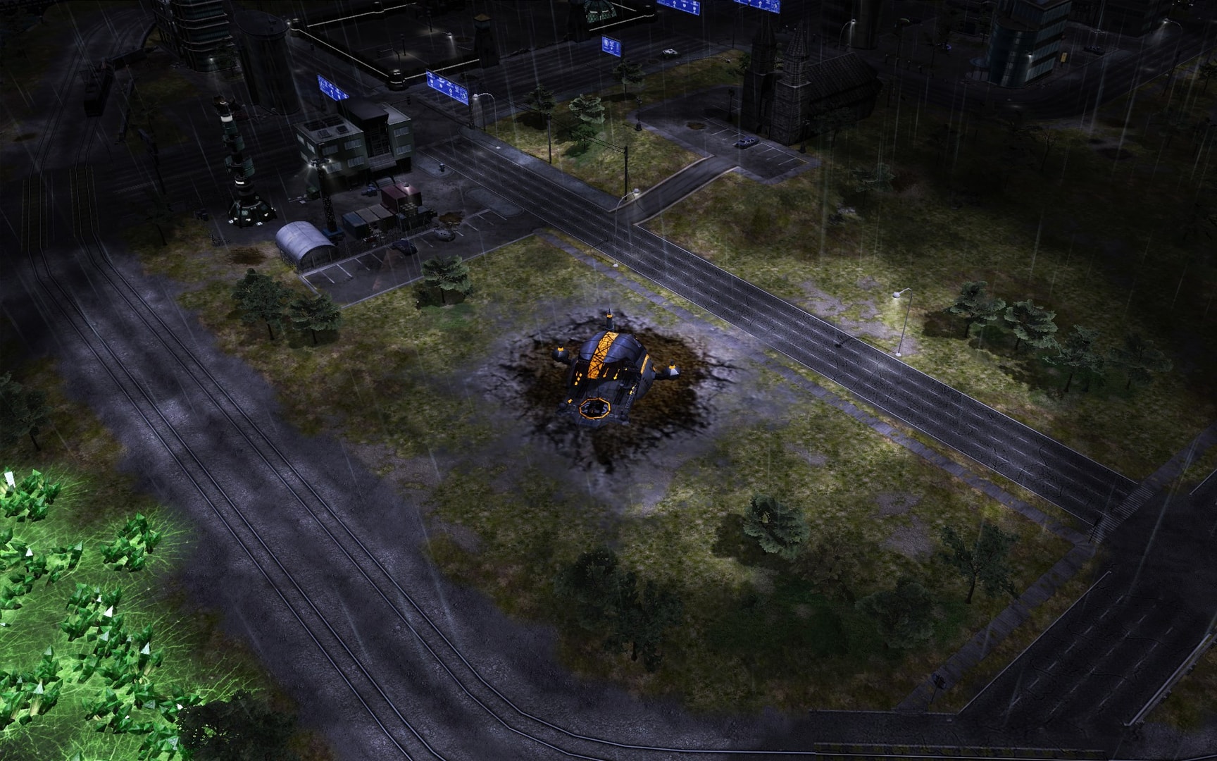 Rain streaks across an urban battlefield in Tiberium Wars: Firestorm, with a hovering unit and green Tiberium beside the road.