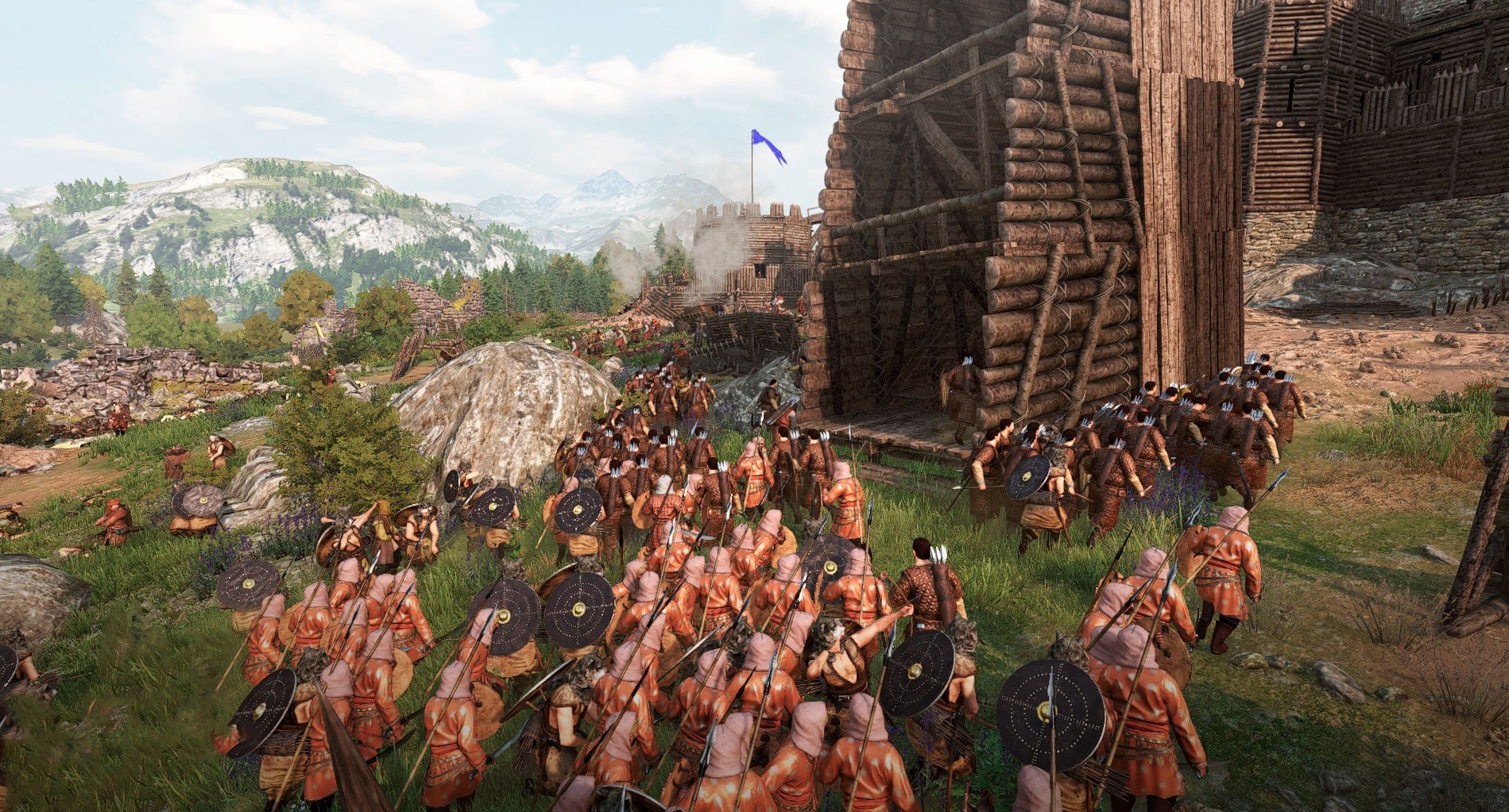 Shield-bearing infantry and archers crowd toward a wooden gate beneath a fortified wall in Full Invasion 3.