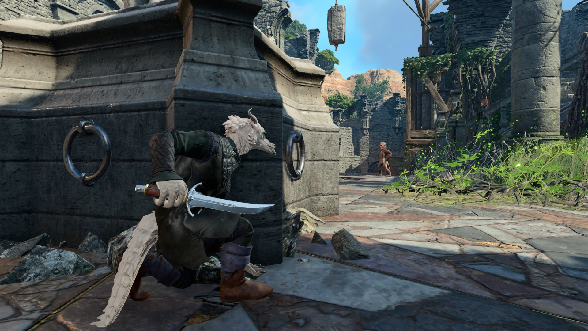 A pale kobold carrying a curved dagger crouches beside a stone wall in Baldur’s Gate 3.