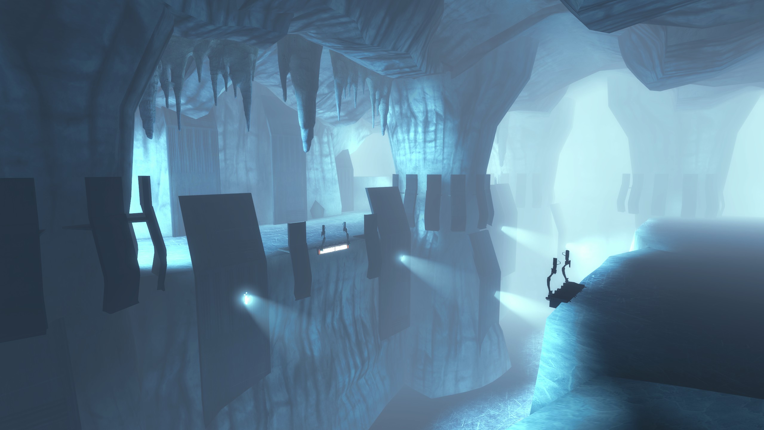 Industrial platforms and spotlights line a blue-lit ice cavern in All Good Things.