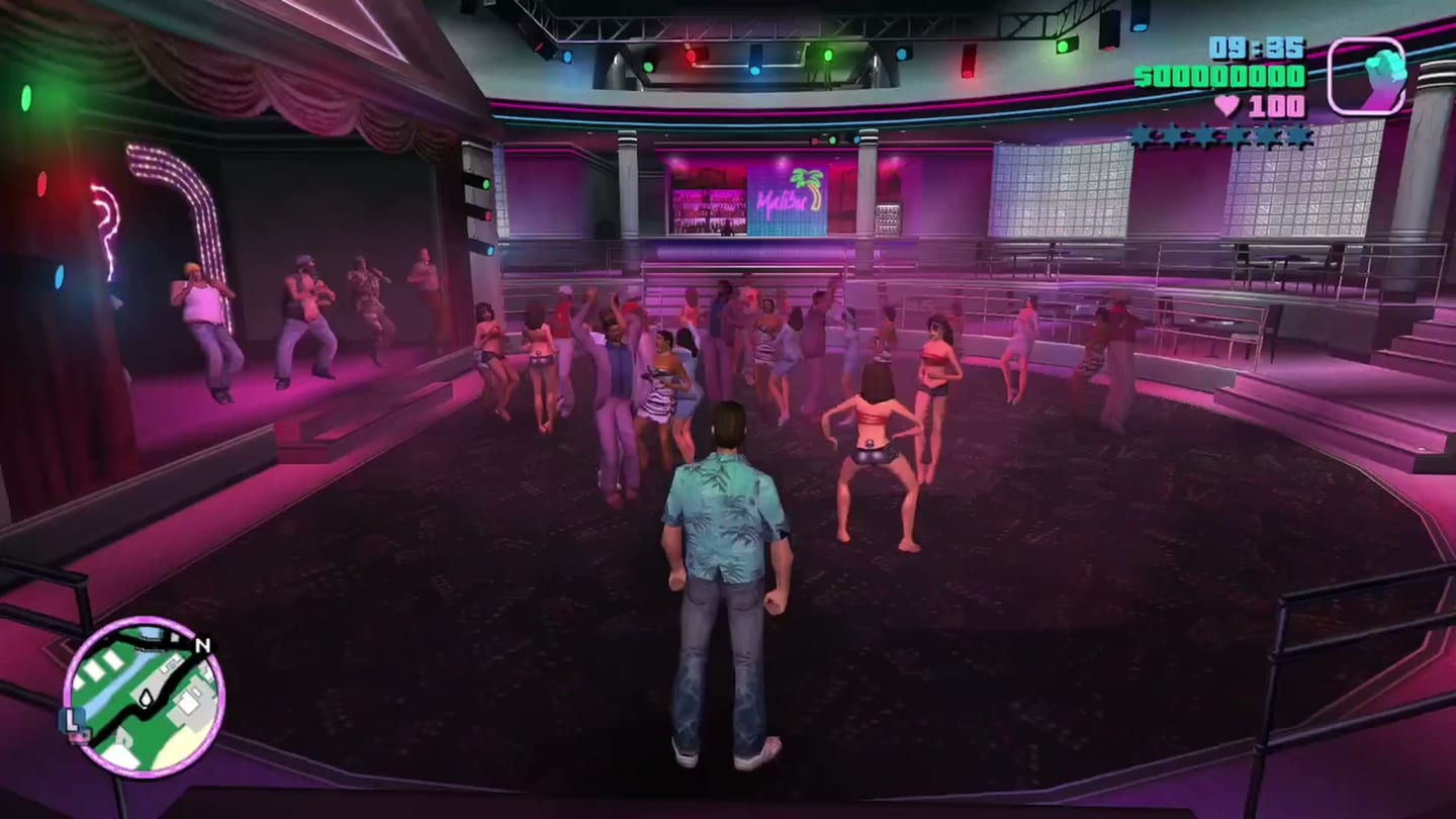 Tommy Vercetti stands amid dancers in a pink-lit Vice City nightclub.
